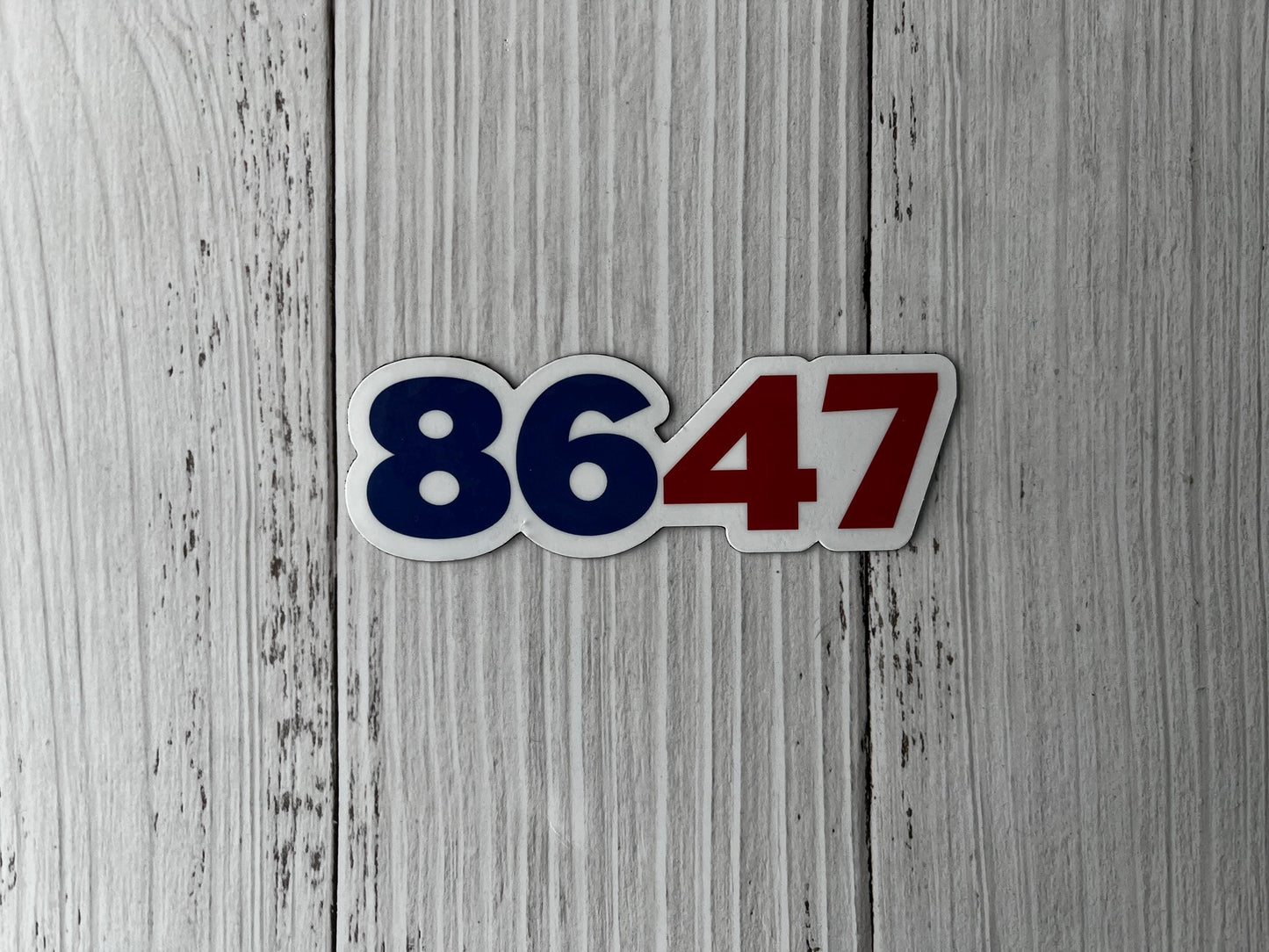 8647 magnet shown on a table as a minimalist yet powerful political statement.