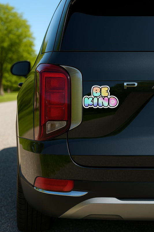 'Be Kind Sticker or' magnet or vinyl decal displayed on the back of a black SUV. A bold, high-quality political sticker perfect for cars, laptops, fridges, or toolboxes. Great for activists, protestors, or anyone fed up with fascism.