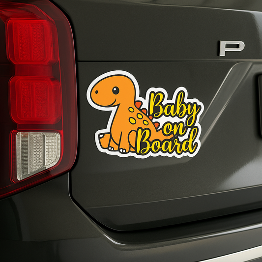 Baby on Board” orange dinosaur decal placed on the back of a black SUV near the left taillight.