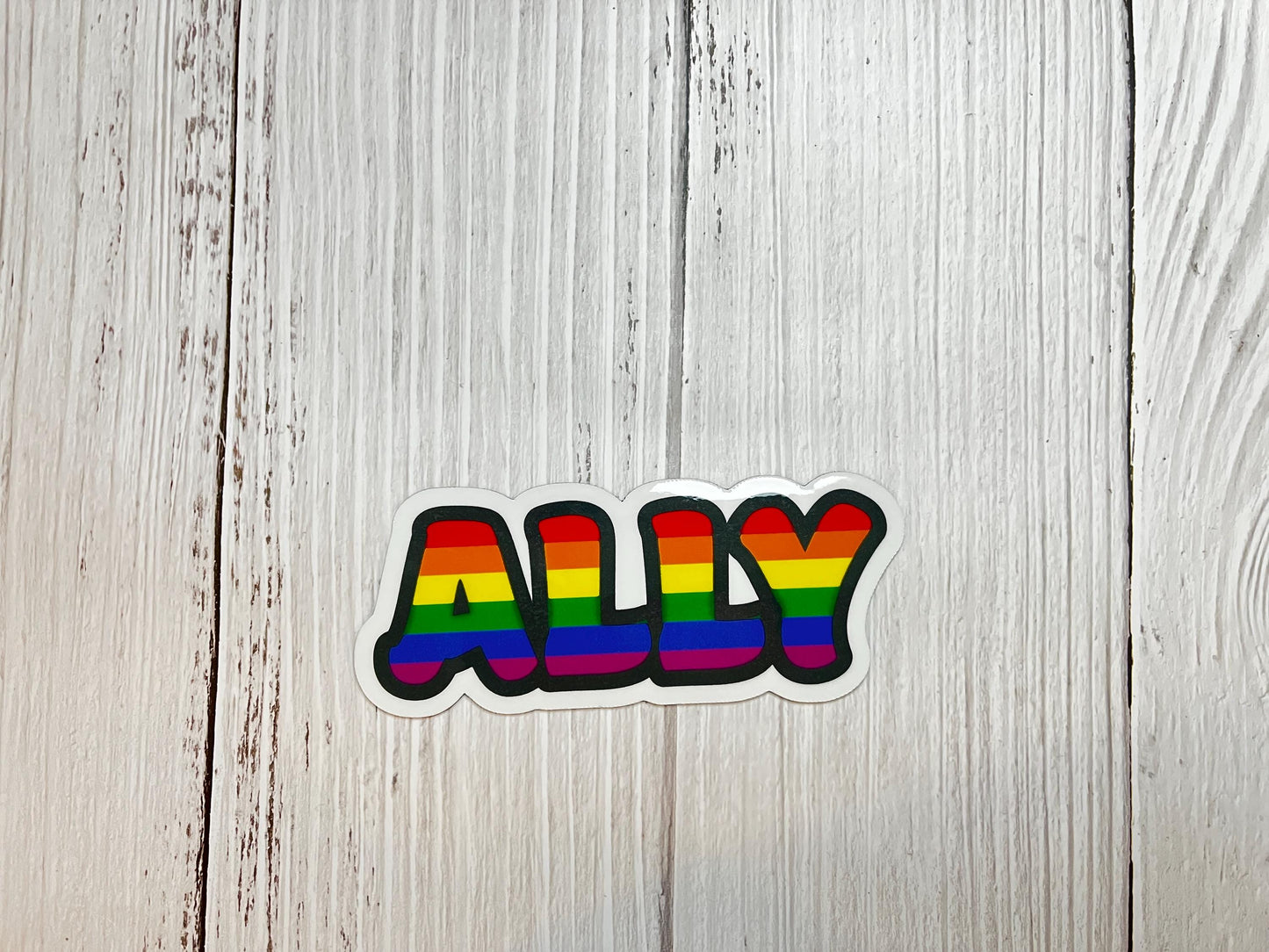 Gay Pride Ally magnet displayed on a table as a bold statement of support and inclusion.
