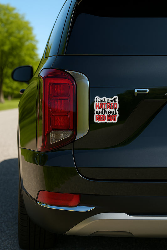 'Can't Spell Hatred Without Red Hat' magnet or vinyl decal displayed on the back of a black SUV. A bold, high-quality political sticker perfect for cars, laptops, fridges, or toolboxes. Great for activists, protestors, or anyone fed up with fascism.