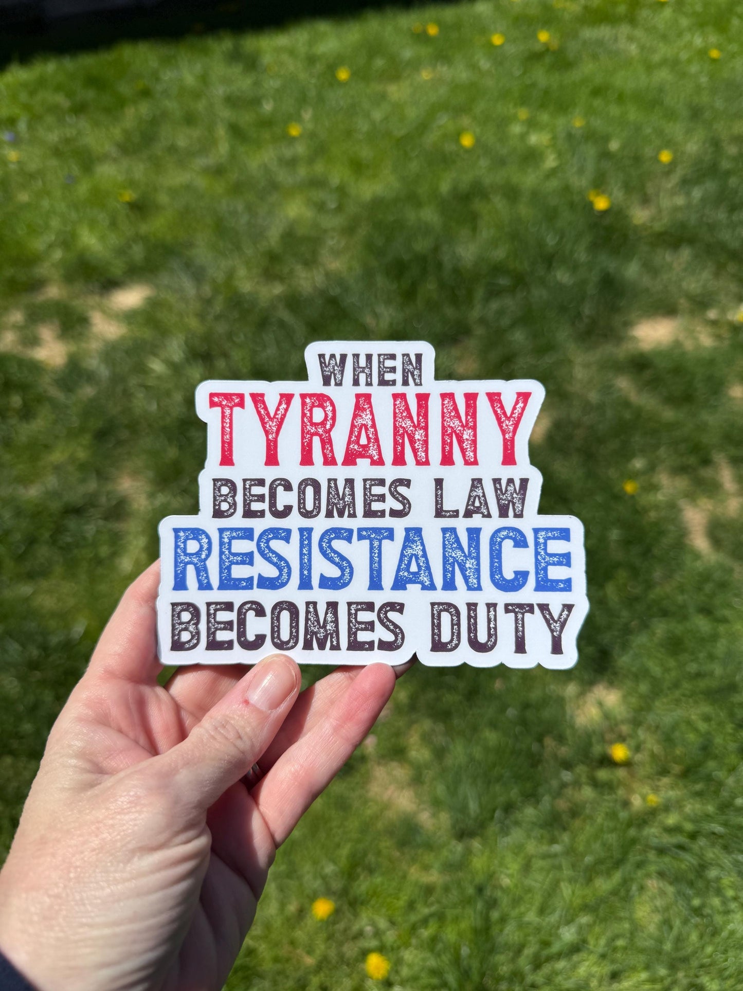 A bold magnet or vinyl decal that reads “When Tyranny Becomes Law, Resistance Becomes Duty” in striking, attention-grabbing font.