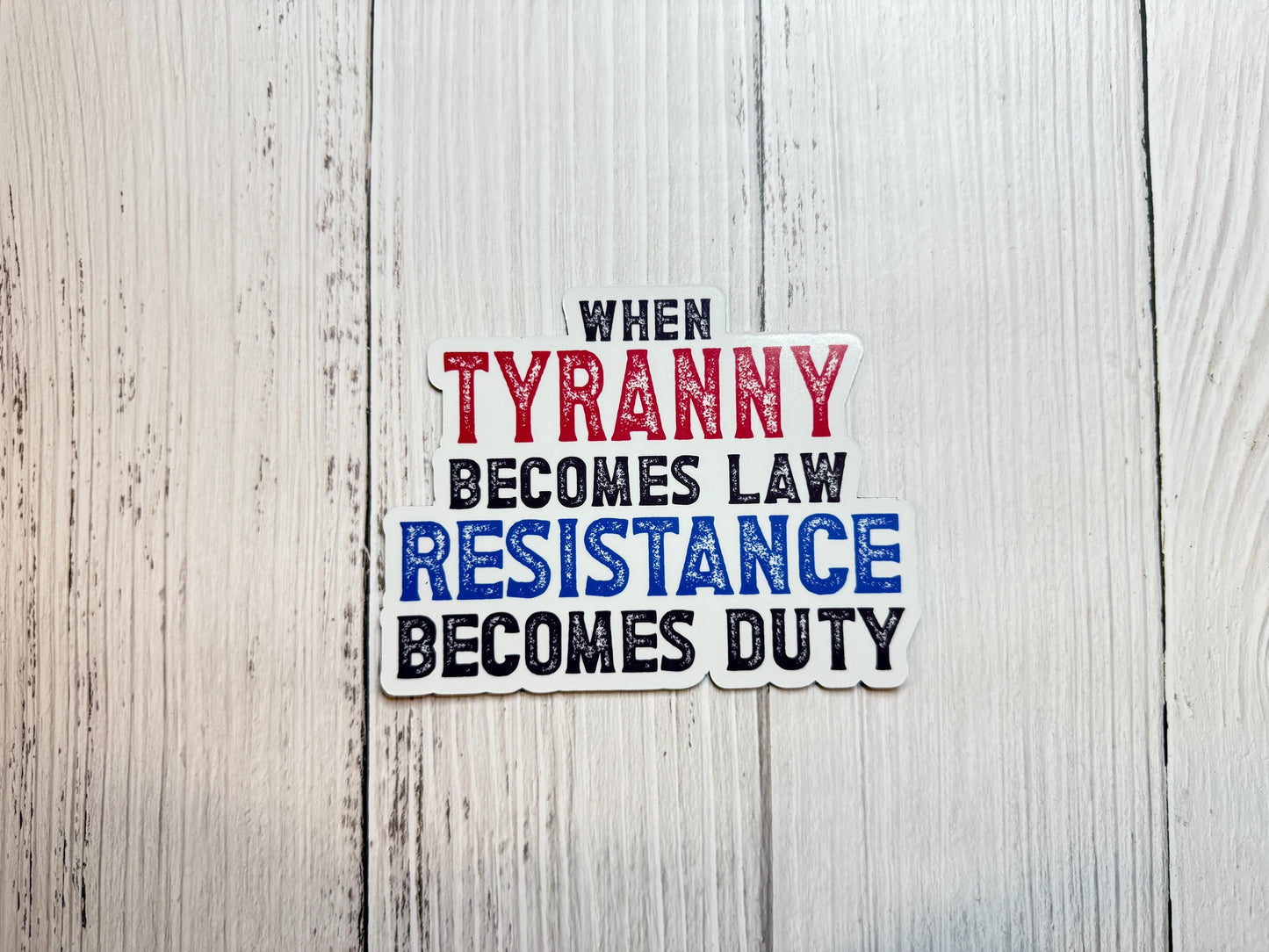 A bold magnet or vinyl decal that reads “When Tyranny Becomes Law, Resistance Becomes Duty” in striking, attention-grabbing font.