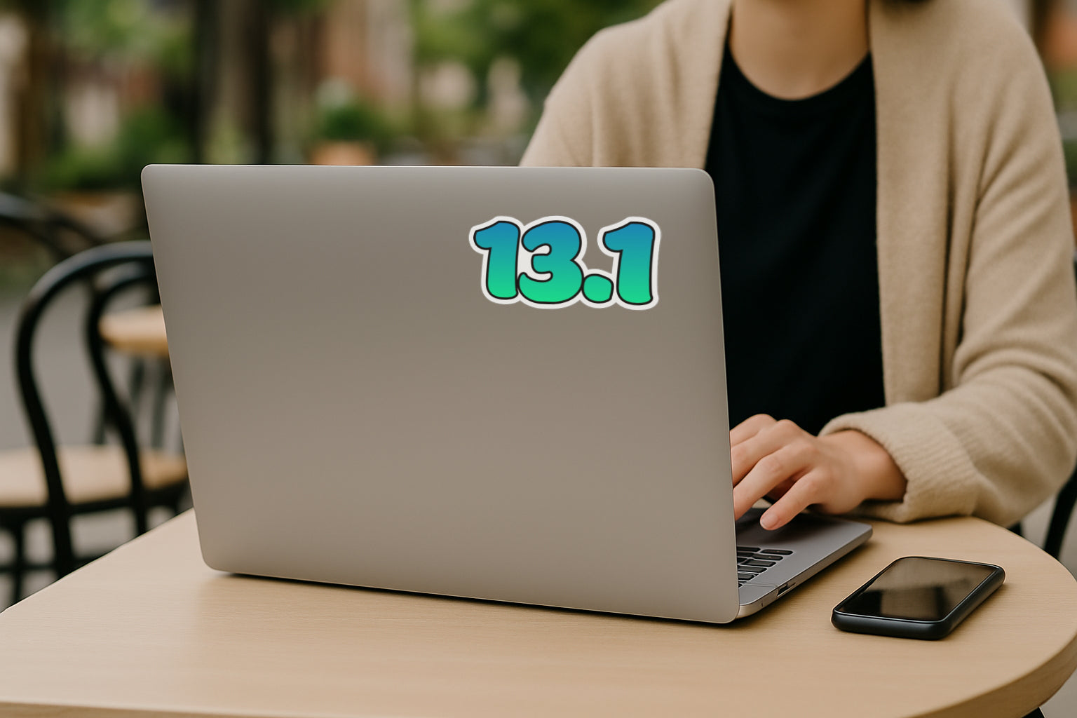 '13.1 Half Marathon' magnet or vinyl decal displayed on the back of a laptop. A bold, high-quality political sticker perfect for cars, laptops, fridges, or toolboxes. Great for activists, protestors, or anyone fed up with fascism.
