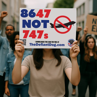 Person holding a protest sign that reads "8647 Not 747s" with a crossed-out airplane graphic, downloaded for free from TheDefiantDog.com