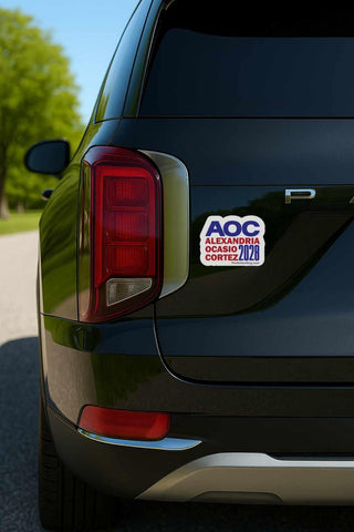 AOC 2028 Alexandria Ocasio Cortez political vinyl decal displayed on back window of black SUV for progressive election support