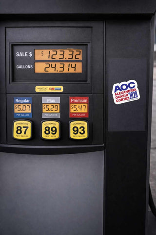 AOC Alexandria Ocasio Cortez 2028 political sticker attached to gas pump panel with bold campaign inspired typography