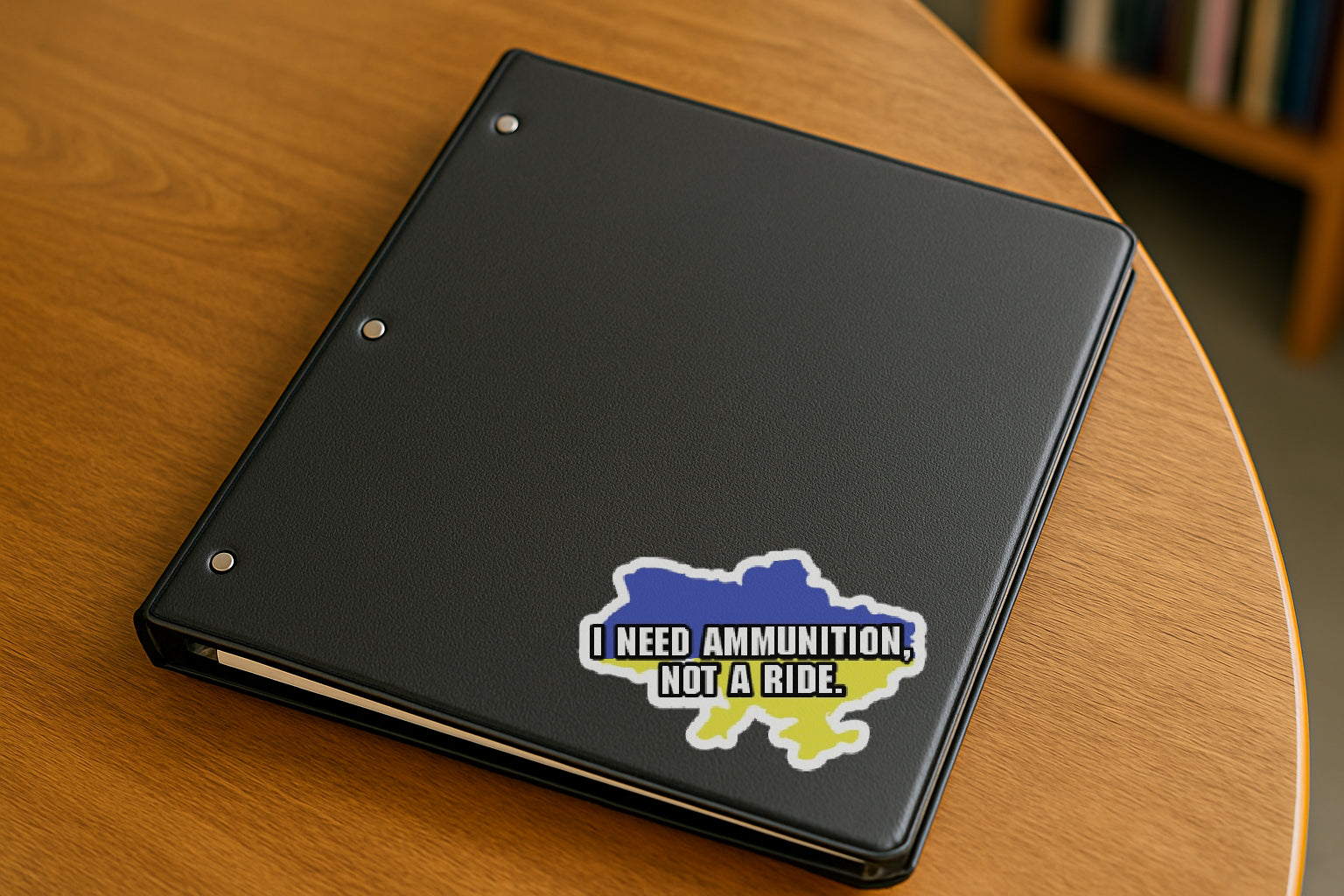 'I Need Ammunition  Not a Ride' magnet or vinyl decal displayed with a slight shadow on a white background. A bold, high-quality political sticker perfect for cars, laptops, fridges, or toolboxes. Great for activists, protestors, or anyone fed up with fascism.