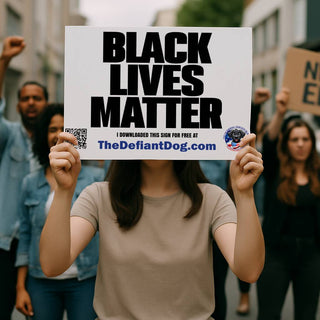 Person holding a 'Black Lives Matter' sign with a QR code at a protest.