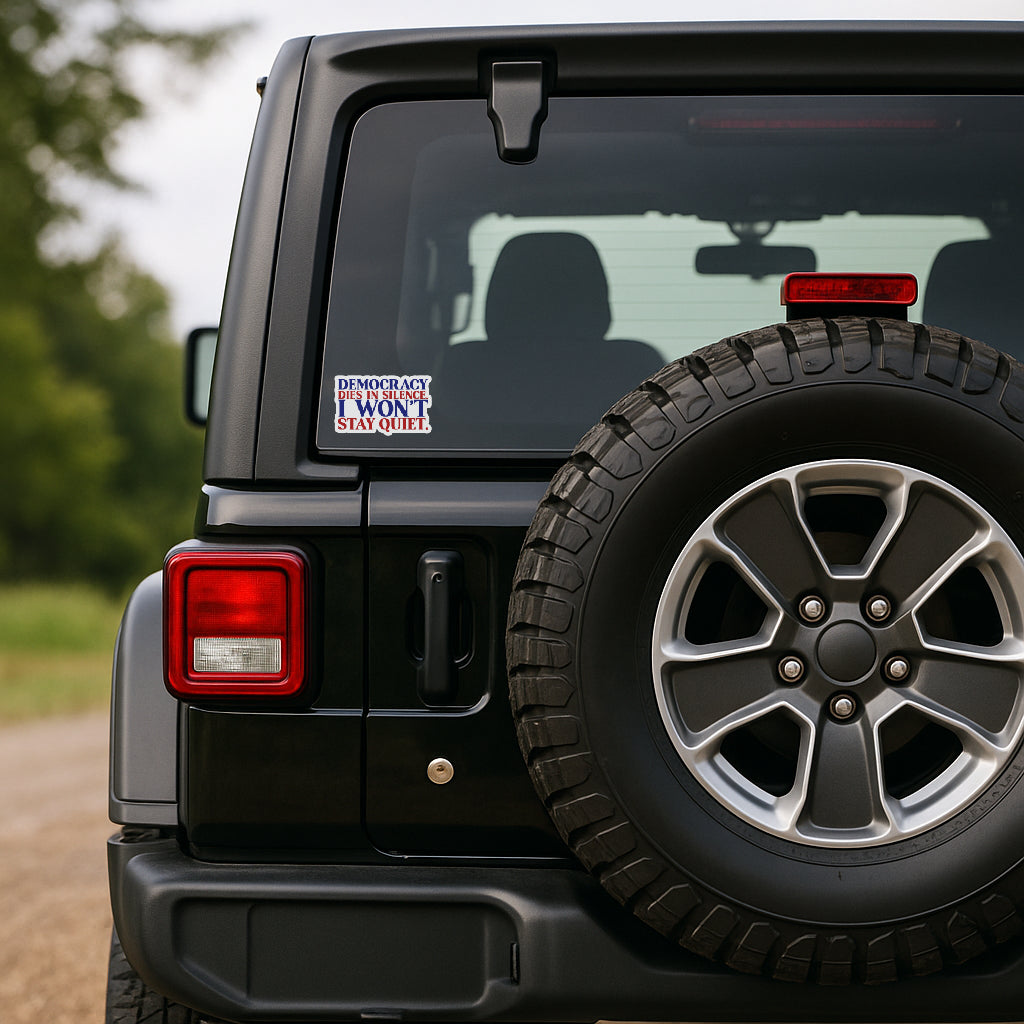 'Democracy Dies in Silence I Won't Stay Quiet' magnet or vinyl decal displayed on the back of a black Jeep. A bold, high-quality political sticker perfect for cars, laptops, fridges, or toolboxes. Great for activists, protestors, or anyone fed up with fascism.