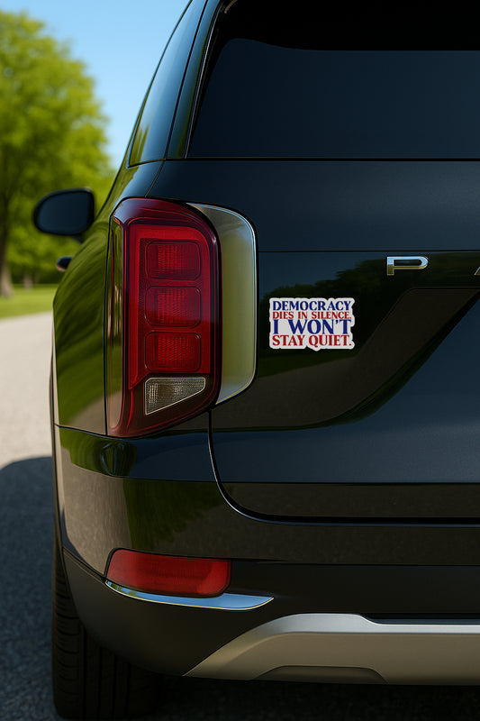 'Democracy Dies in Silence I Won't Stay Quiet' magnet or vinyl decal displayed on the back of a black SUV. A bold, high-quality political sticker perfect for cars, laptops, fridges, or toolboxes. Great for activists, protestors, or anyone fed up with fascism.