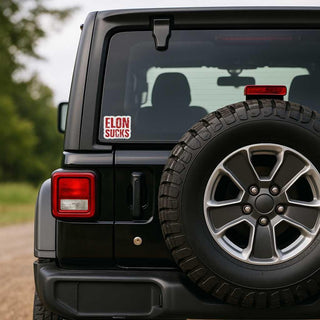 Black Jeep with a 'Elon Sucks' sticker on the back window