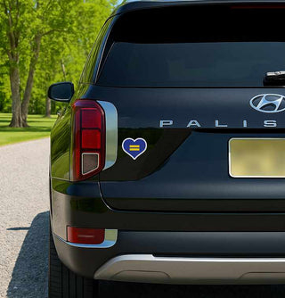 Hyundai Palisade with a heart-shaped equality symbol sticker on the back