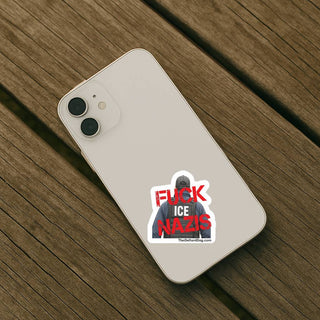 Phone case with a sticker on a wooden surface