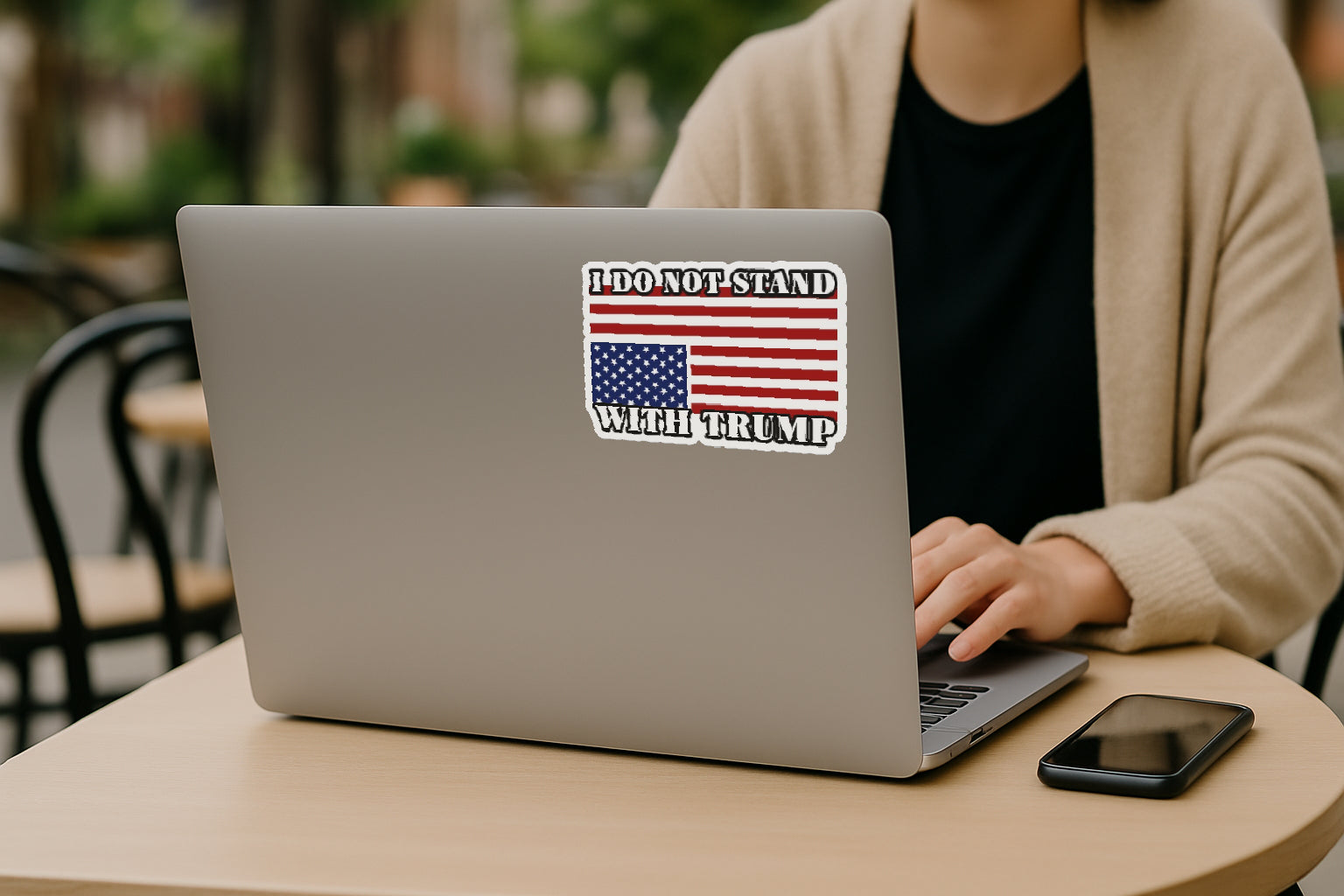 'I Do Not Stand with Trump' magnet or vinyl decal displayed on the back of a laptop. A bold, high-quality political sticker perfect for cars, laptops, fridges, or toolboxes. Great for activists, protestors, or anyone fed up with fascism.