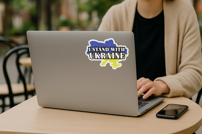 'I Stand with Ukraine  Slava Ukraini' magnet or vinyl decal displayed on the back of a laptop. A bold, high-quality political sticker perfect for cars, laptops, fridges, or toolboxes. Great for activists, protestors, or anyone fed up with fascism.