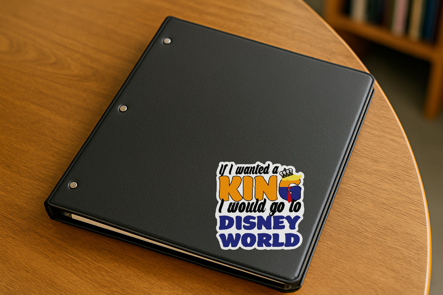 'If I Wanted a King I'd Go to Disney World' magnet or vinyl decal displayed with a slight shadow on a white background. A bold, high-quality political sticker perfect for cars, laptops, fridges, or toolboxes. Great for activists, protestors, or anyone fed up with fascism.