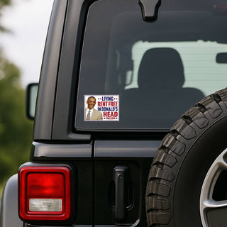 Barack Obama Living Rent Free in Donald's Head Since 2008 political sticker on the rear window of a black Jeep.
