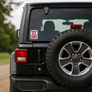 Black Jeep with a 'MAGA is a Cult' sticker on the back window.