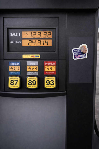 Funny anti MAGA Magalline vinyl decal displayed on a gas pump featuring political satire and anti Trump messaging.
