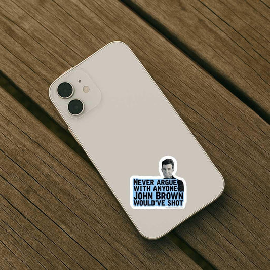 Phone case with a sticker of a person and text on a wooden surface