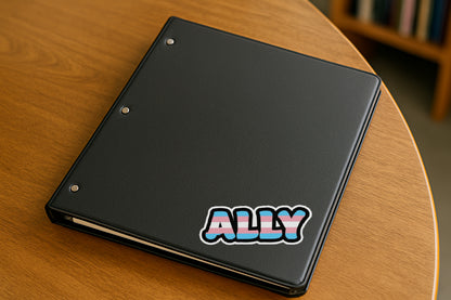 Trans Pride Ally' magnet or vinyl decal displayed on a black binder in a library. A bold, high-quality political sticker perfect for cars, laptops, fridges, or toolboxes. Great for activists, protestors, or anyone fed up with fascism.