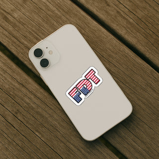 20-piece anti-Trump vinyl sticker pack featuring bold political messages, protest slogans, and resistance designs from TheDefiantDog.com o n the back of an iphone.