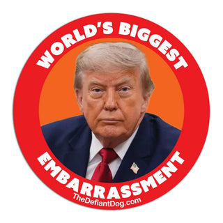 A circular political button badge featuring a portrait of Donald Trump with the text 'WORLD'S BIGGEST EMBARRASSMENT' in white on a red and orange background.
