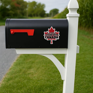 As an American I Stand With Canada political statement sticker displayed on the side of a black suburban mailbox.