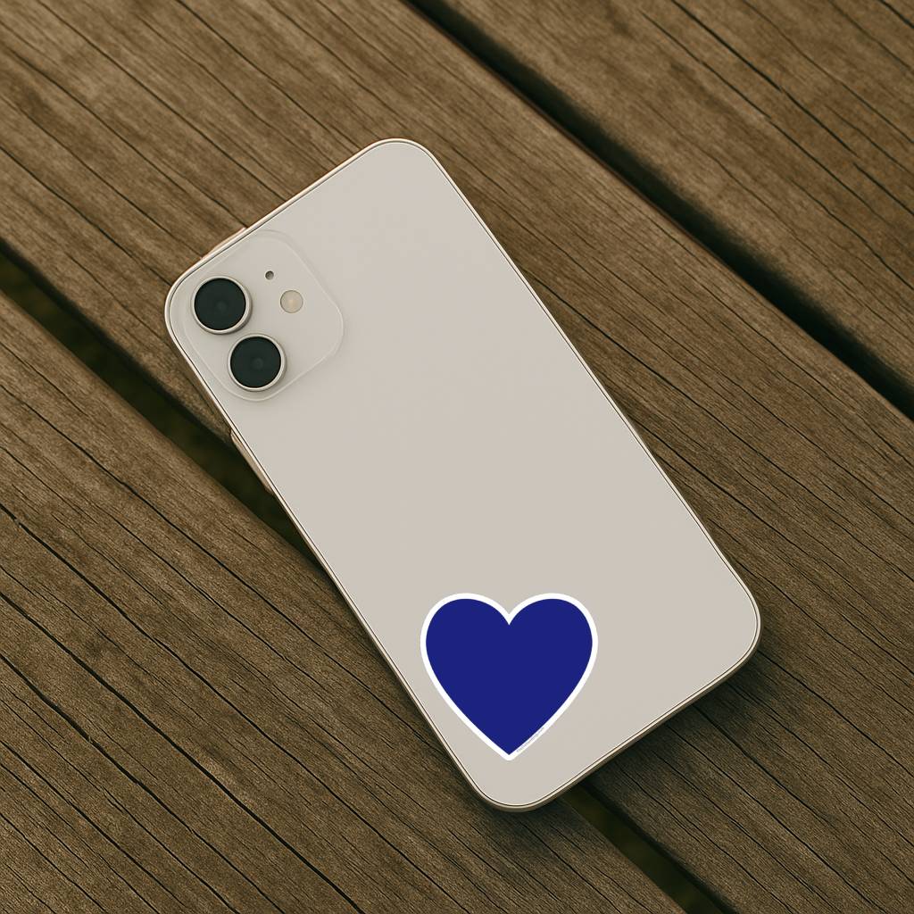 Phone with a blue heart on a wooden surface