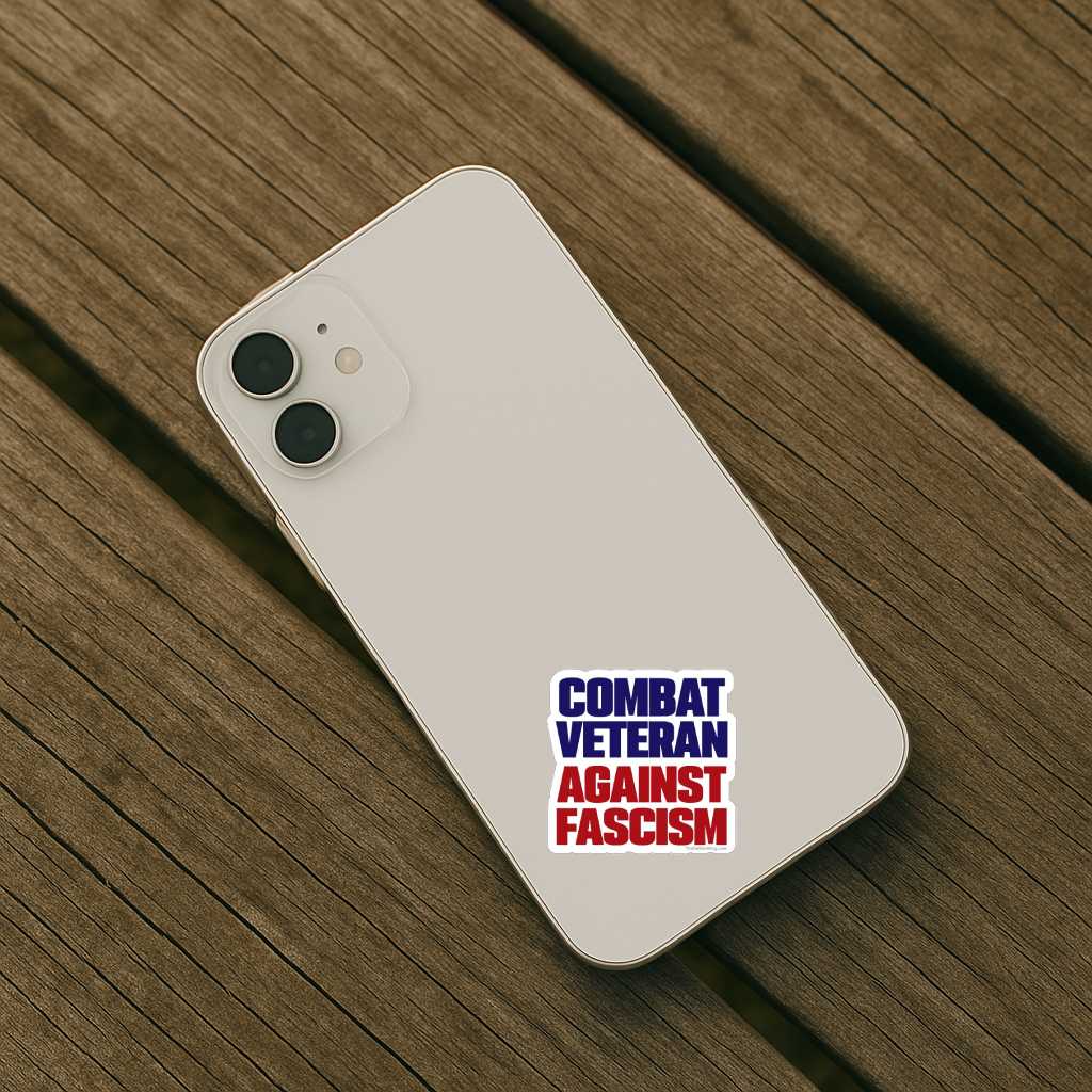 Phone case with 'Combat Veteran Against Fascism' text on a wooden surface