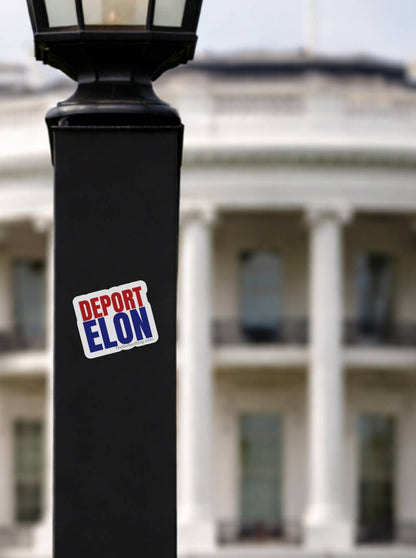 Deport Elon anti Trump protest sticker on black lamp post near White House, progressive political vinyl decal, bold red and blue liberal activist street art style sticker, political resistance statement design