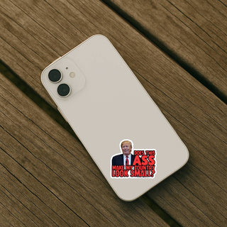Light colored iPhone with Does This Ass Make My Country Look Small anti Trump sticker applied to the back. Small durable vinyl decal perfect for phones and cases.