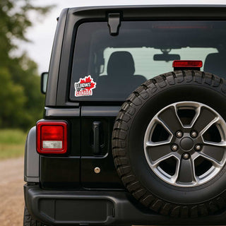 Black Jeep with a 'elbows up for canada