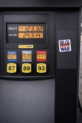 Close-up of a black gas pump display showing sale price, gallons, and fuel options 87, 89, and 93, with a sticker reading 'END THE IRAN WAR' on the right side.