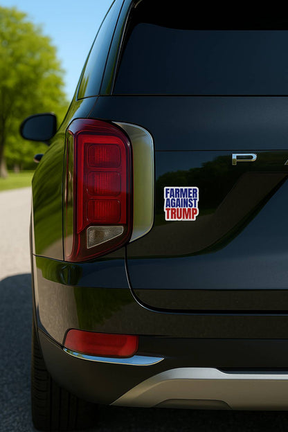 Black SUV with 'Farmer Against Trump' bumper sticker on a blurred outdoor background