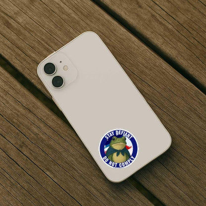 Phone case with a frog graphic and text on a wooden surface