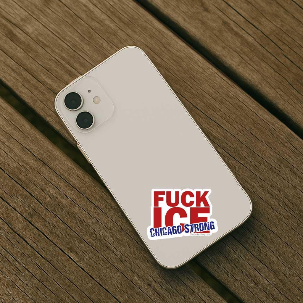 Phone with a sticker that says fuck ice chicago strong on a wooden surface