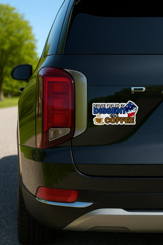Sticker reading “Driver Fueled by Dissent and Coffee” with a raised fist in an American flag pattern and a steaming coffee cup.