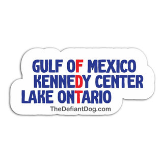 A white cloud-shaped sticker or decal with the text 'GULF OF MEXICO KENNEDY CENTER LAKE ONTARIO' in blue and red, plus 'TheDefiantDog.com' below, shown on a plain white background.