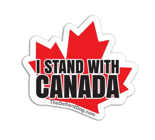 A die-cut sticker featuring a red maple leaf with the text 'I STAND WITH CANADA' in black and white, plus a small website URL along the bottom edge, shown on a plain white background.