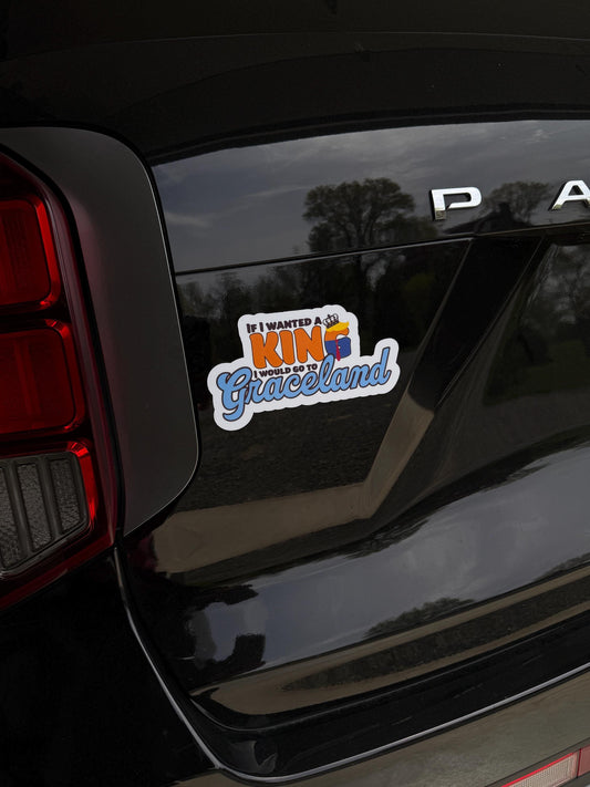 If I Wanted a King I Would Go to Graceland magnet displayed on the back of a car, promoting democracy and resistance to authoritarianism.