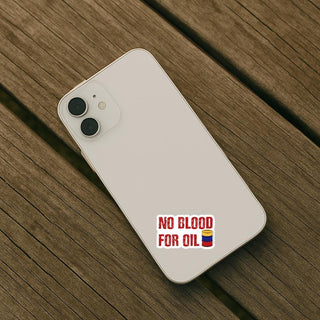 Phone case with 'No Blood for Oil' design on a wooden surface