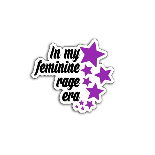 In My Feminine Rage Era magnet held in hand, symbolizing feminist resistance and strength