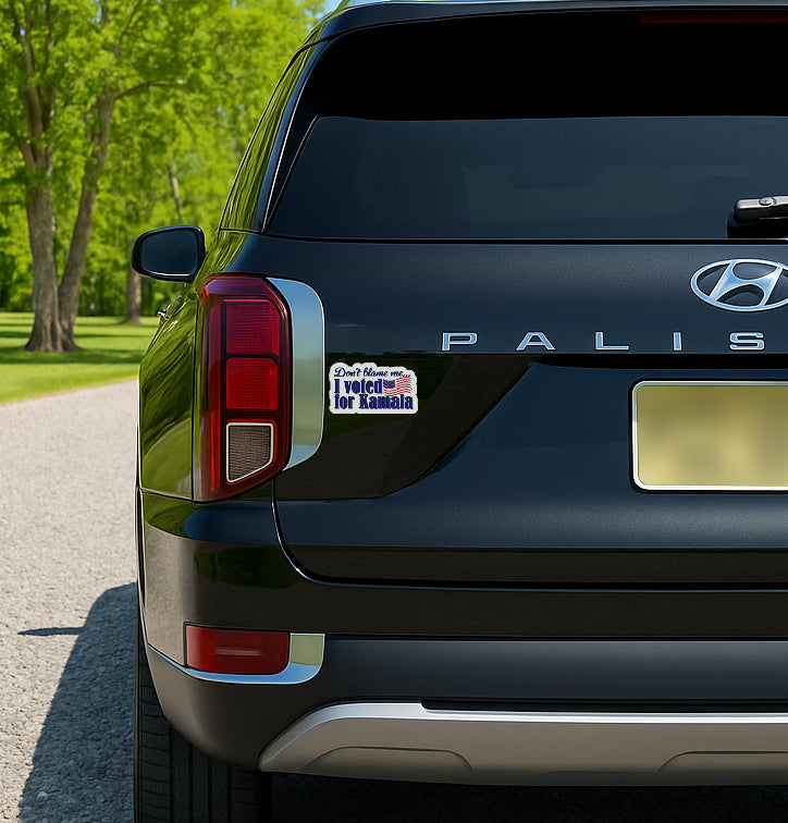 'Don't Blame Me  I Voted for Kamala' magnet or vinyl decal displayed on the back of a black SUV. A bold, high-quality political sticker perfect for cars, laptops, fridges, or toolboxes. Great for activists, protestors, or anyone fed up with fascism.