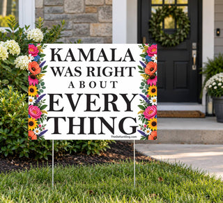 Kamala Was Right About Everything floral political yard sign displayed on a metal H-stake in a front lawn near a house.