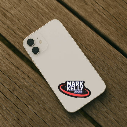 Phone case with Mark Kelly 2028 design on a wooden surface