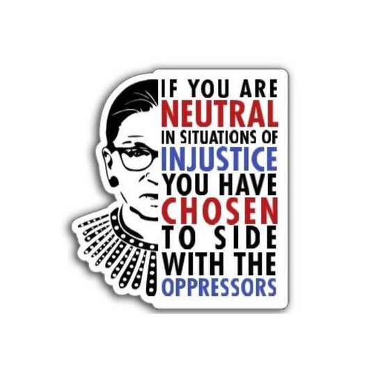 If you are neutral in situations of injustice, you have chosen to side with the oppressor magnet displayed on a table promoting action over silence.
