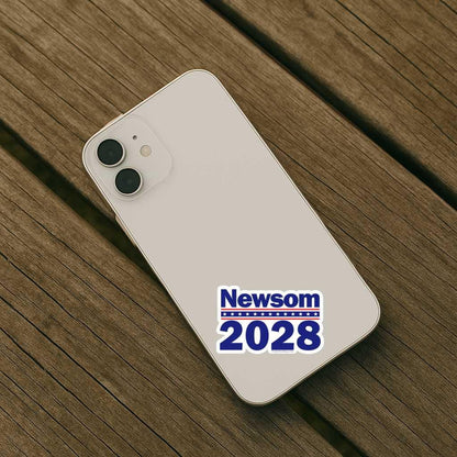 Phone case with 'Newsom 2028' design on a wooden surface