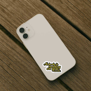 Sticker with text 'Nobody is treading on you, sweetie' on an iphone